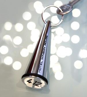 Modern hotel key tags with personalized engraving