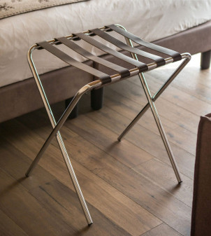 Folding luggage stand in polished chromed metal