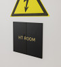 Signage in black or white plexiglass with printed characters