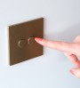 Brass electric plates with round buttons